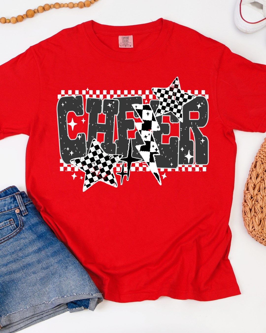 Red t-shirt with 'CHEER' design on a white background