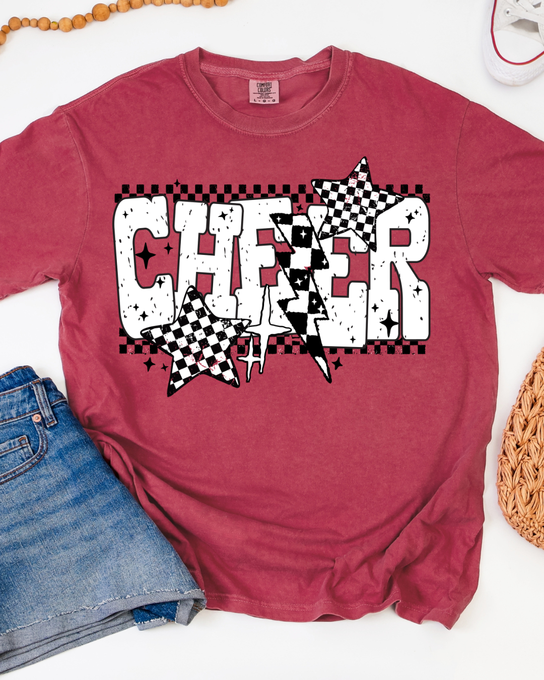 Red t-shirt with 'CHEER' design on a white background