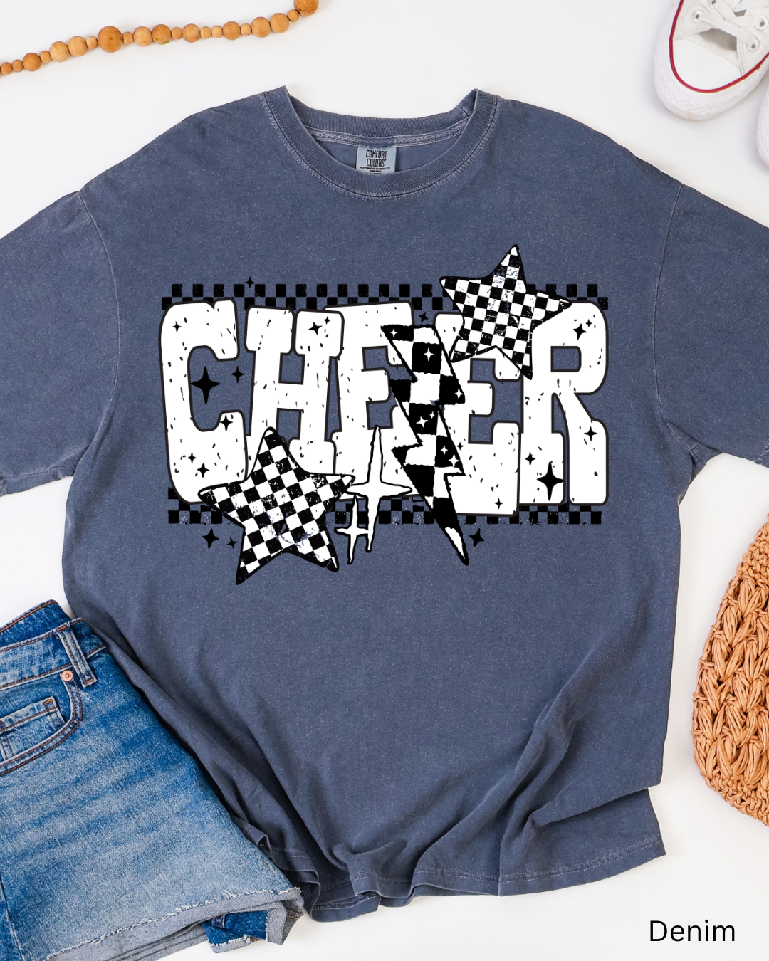 Denim blue t-shirt with 'CHEER' design on a white background