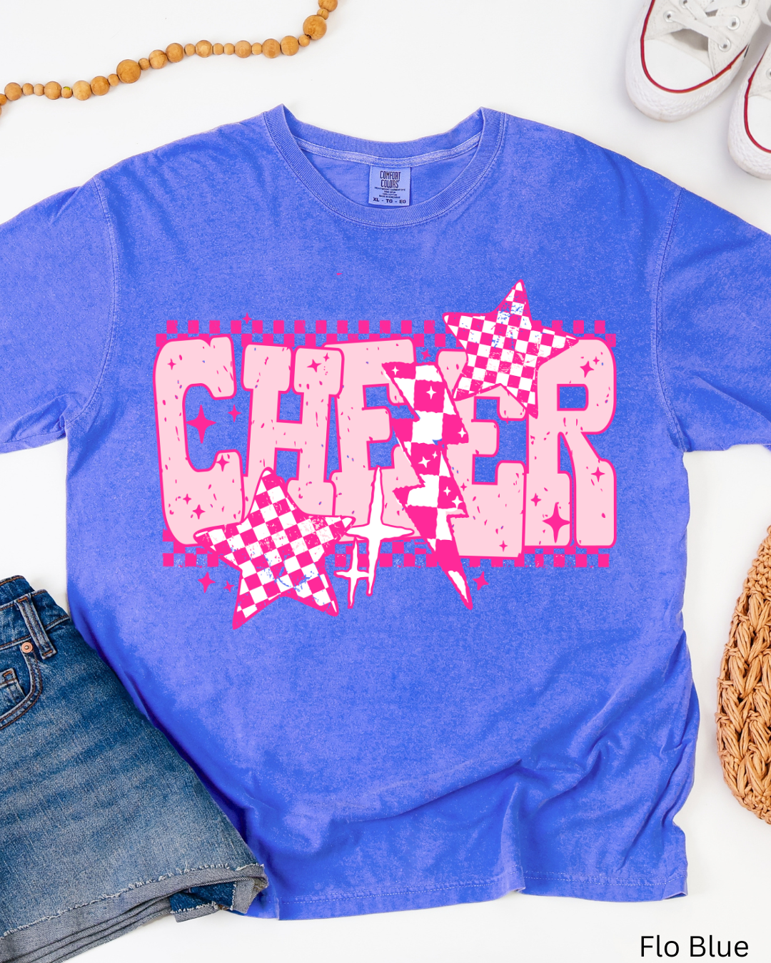 Blue t-shirt with pink 'CHEER' design on a white background