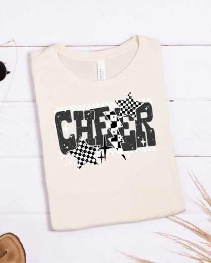 Beige t-shirt with 'CHEER' design on a white wooden background