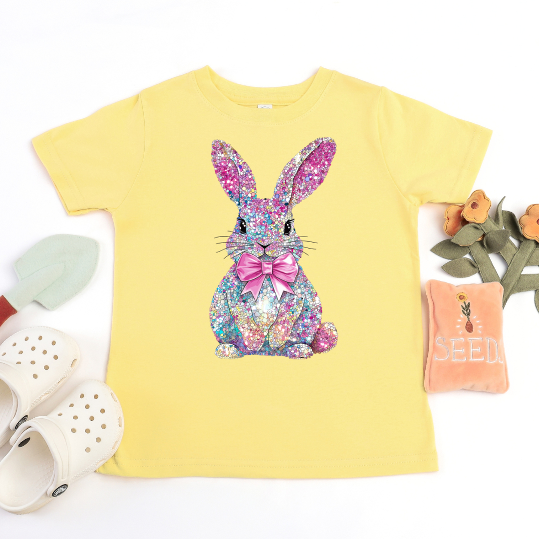 Yellow t-shirt with a Faux rhinestone bunny design on a white background
