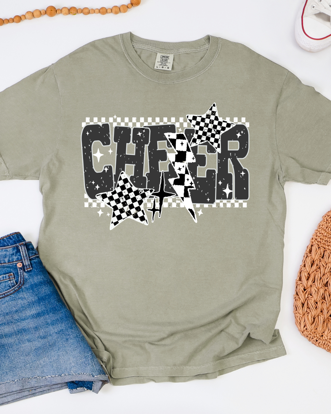 Green t-shirt with 'CHEER' design on a white background