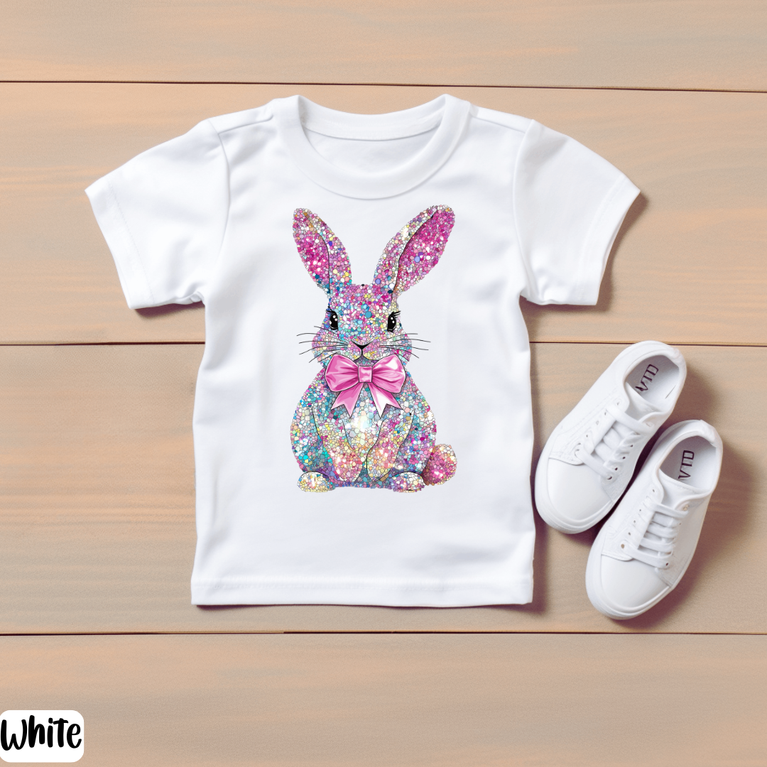 White t-shirt with colorful bunny design and white sneakers 